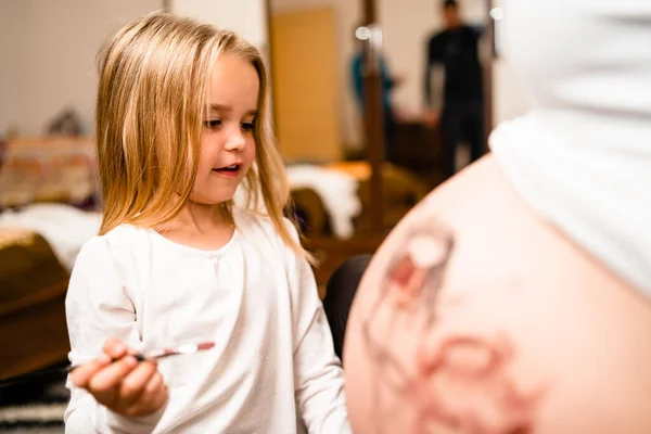 Little Blonde Girl Painting Little Baby Brother Sister Her Mothers — Stock Photo, Image