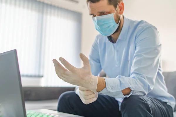 Caucasian Man Wearing Protective Mask Putting Glove Hand Rubber Gloves — Stock Photo, Image