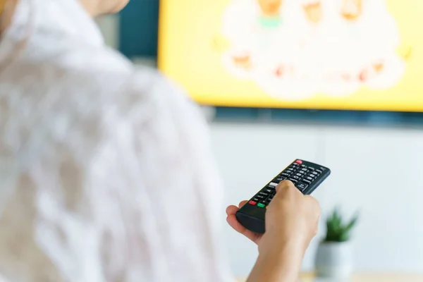 Back View Hand Unknown Caucasian Woman Holding Remote Controller Changing — Stock Photo, Image