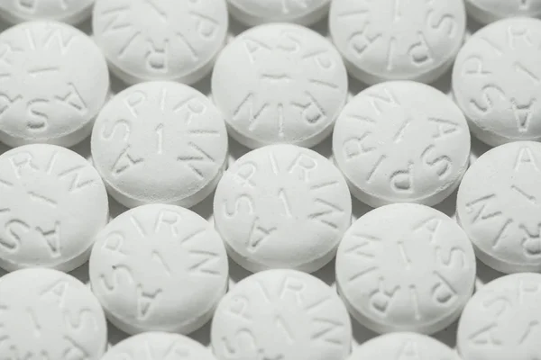Macro-opname van witte aspirine pillen — Stockfoto