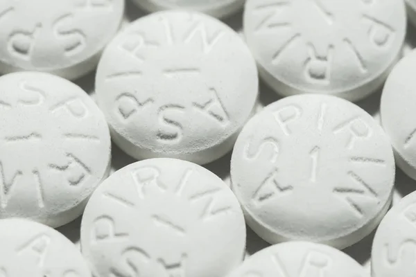 Macro inyección de pastillas de aspirina blanca — Foto de Stock
