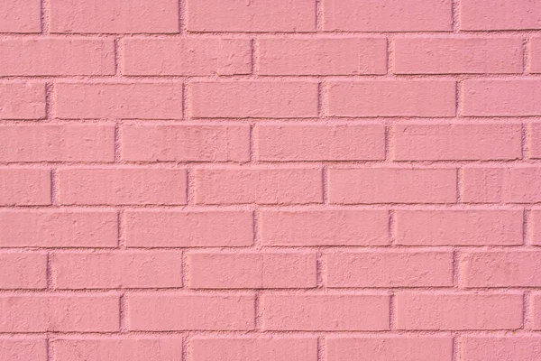 Hintergrundbild der flachen rosa Ziegelwand Stockfoto