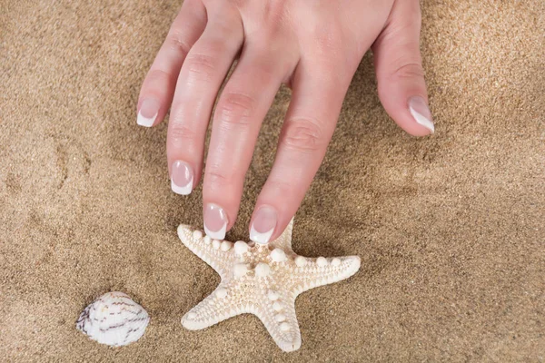 Girl Hand French Nails Polish Style Touching Starfish Sandy Beach — Stock Photo, Image