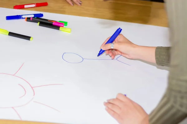 Girl Hand Blue Felt Pen Drawing Stickman Big White Paper — Stock Photo, Image