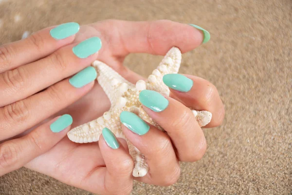 Girl Hands Turquoise Color Nails Polish Holding Starfish Sea Sand — Stock Photo, Image