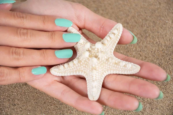 Young Girl Hands Turquoise Color Nails Polish Holding Starfish Sea — Stock Photo, Image