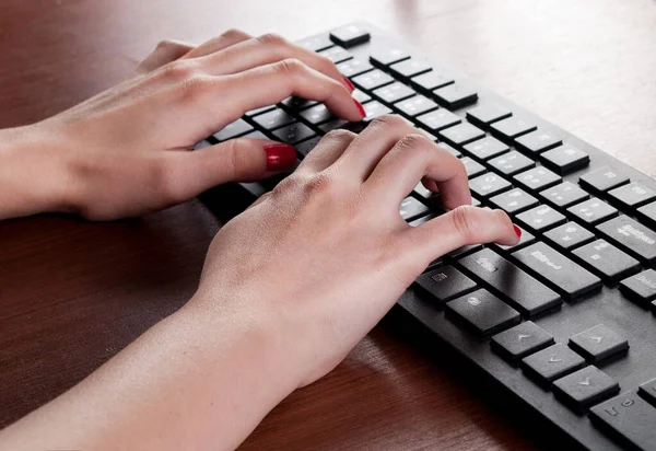 Young Female Typing Black Computer Keyboard Wooden Desk Office Close — Stock Photo, Image