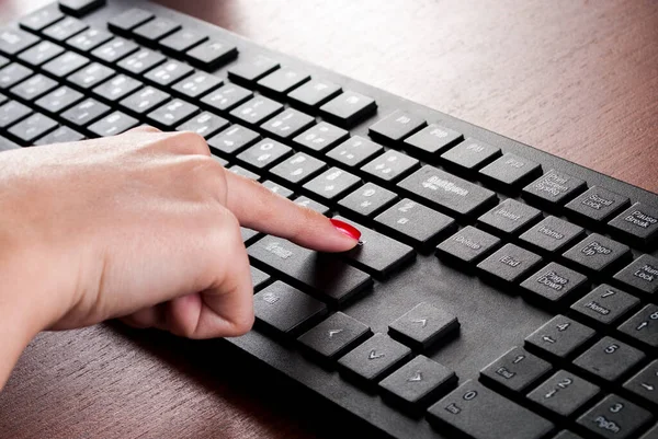 Girl Finger Push Enter Button Computer Keyboard Wooden Desk Close — Stock Photo, Image