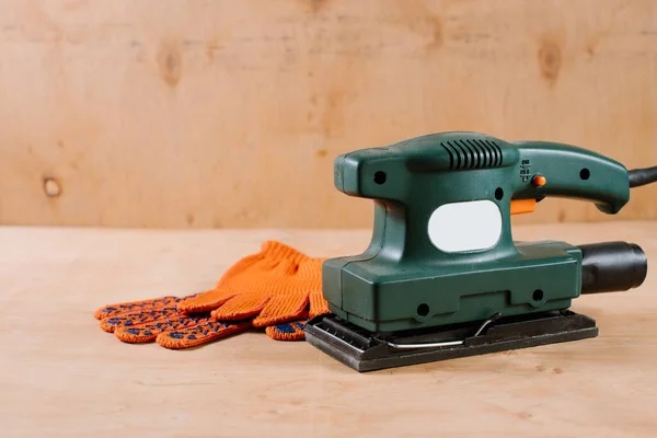 Electric grinding machine on the wooden background — Stock Image Electric Grinding Machine Wooden Background Royalty Free Stock Images