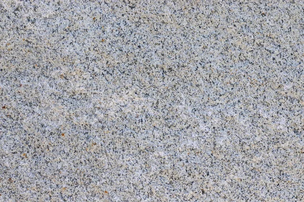 Textura piedra lisa natural. Fondo de piedra natural con salpicaduras de diferentes colores. Manchas oxidadas . — Foto de Stock