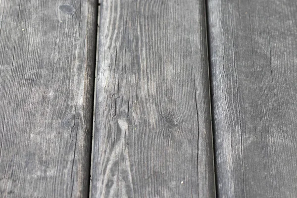Текстура старого деревянного черного фона наклонена. Фон дерева естественного цвета, старые доски, пустой фон. Древесные вертикальные доски крупным планом . — стоковое фото