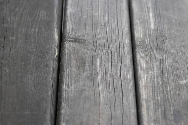 Текстура старого деревянного черного фона наклонена. Фоновое дерево натурального цвета, старые доски с узлами, пустой фон. Древесина заготовки вертикальные доски крупным планом. Симилия — стоковое фото