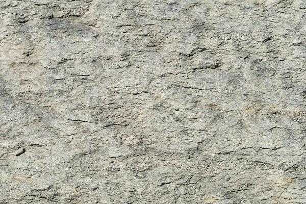 Konsistens av natursten grå. Bakgrunds sten med ett grunt r — Stockfoto