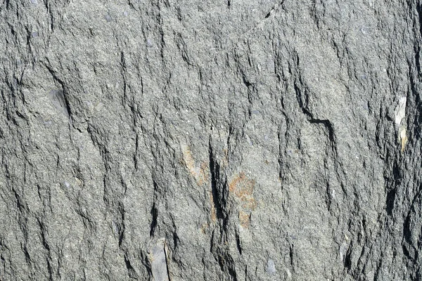 Textura de pedra natural cinza. Pedra de fundo com um grande rel — Fotografia de Stock