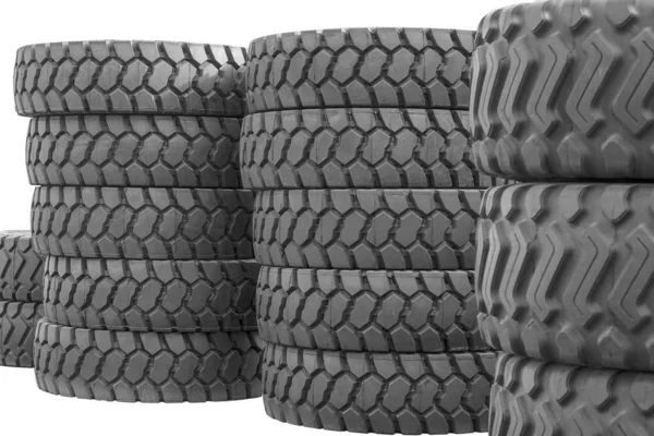 Neumáticos de goma grandes para camiones tirados en la calle. Muchos primeros planos — Foto de Stock