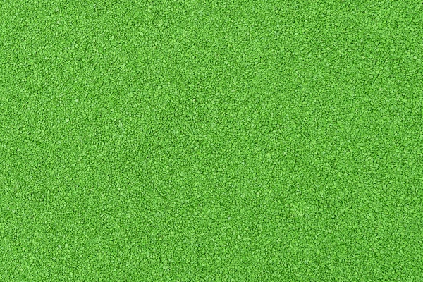 Green textured background smooth surface. Lawn surface or fine texture for a playground.