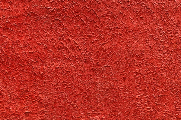 Czerwone sztukaterie tło tekstury. Dekoracyjne nieczysty tło jasnoczerwony kolor. — Zdjęcie stockowe