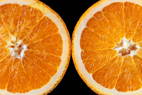 Isolated orange cut in half.