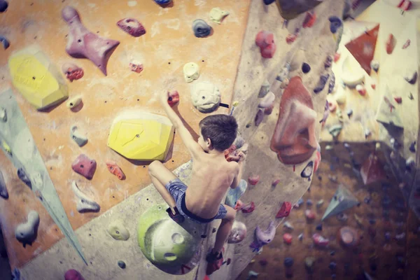 Little Boy Climbing Rock Wall Indoor — Stock Photo, Image