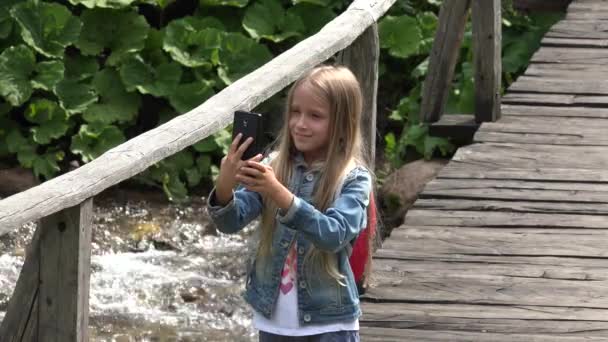 Tourist Girl Playing Tablet Taking Selfie Child Mountains Trail Camp — Stock Video