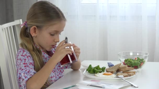 Child Reading Book Kitchen Girl Face Drinking Tea Kid Eating — Stock Video