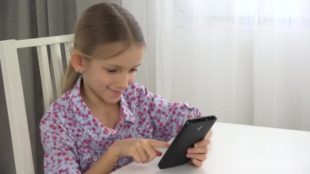 Child Playing Tablet Girl Portrait Surfing Smartphone Kid Face Office — Stock Video