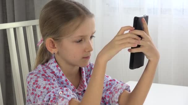 Child Playing Tablet Girl Portrait Surfing Smartphone Kid Face Office — Stock Video