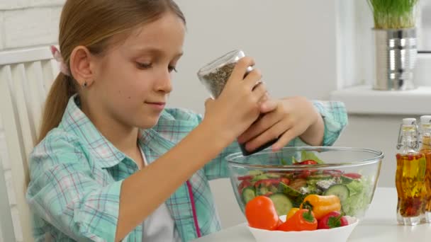 Child Preparing Green Salad Kitchen Girl Eat Fresh Vegetables Healthy — Stock Video