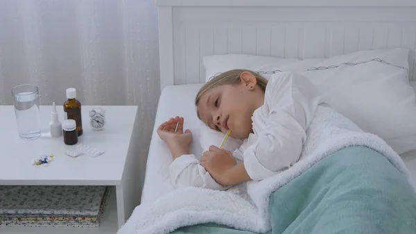 stock image Sick Child in Bed, Ill Kid with Thermometer, Suffering Thoughtful Girl Resting