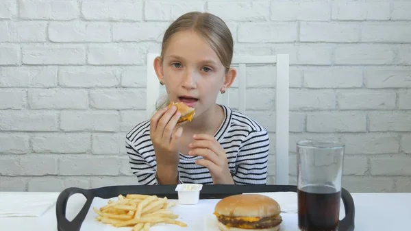 Child Eating Hamburger, Kid in Fast Food Restaurant, Girl Drinking Juice