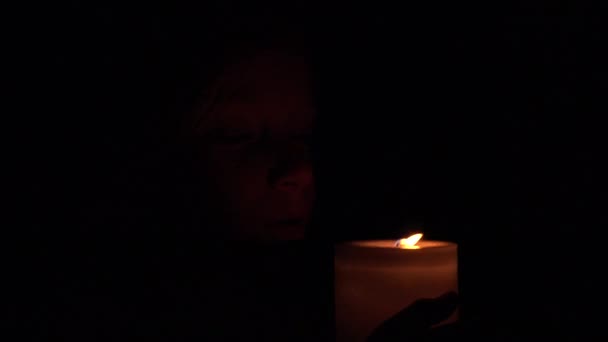 Happy Child with Candles, Prayer Girl in Night, Kid Portrait, Face in Dark 4K — Stock Video