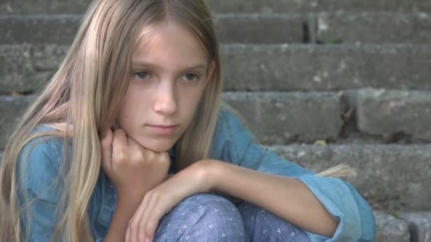 Sad Child, Not Playing Alone Kid, Unhappy Thoughtful Face Girl Outdoor in Park — Stock Video