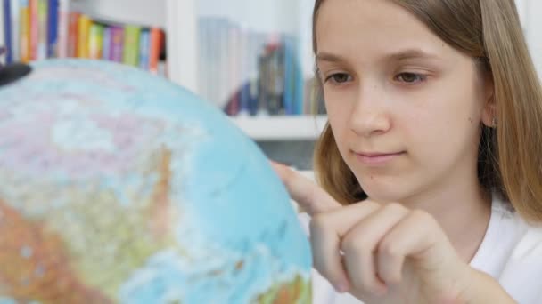 Kid Studying Earth Globe, Child in School Class, Girl Learning in Classroom, Student Schoolgirl Researching Library — Stock Video