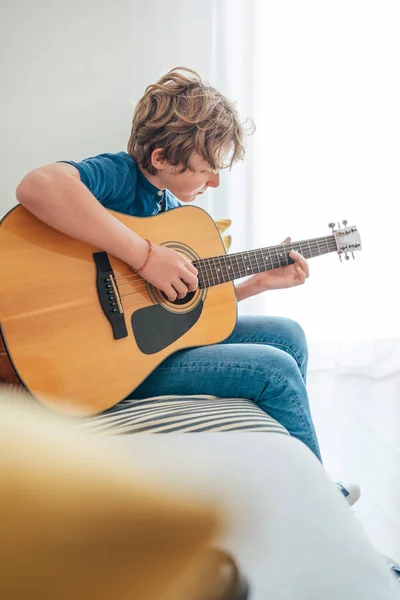 Preteen Boy Playing Acoustic Guitar Dressed Casual Jeans Shirt Sitting — Stock Photo, Image