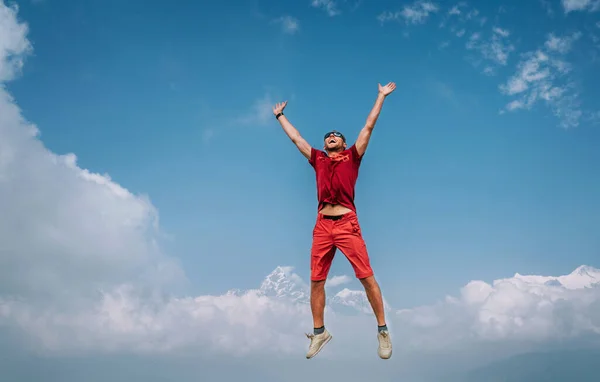 Happy Man Dressed Red Jumping Clouds Annapurna Range Mountains Machapuchare — Stock Photo, Image