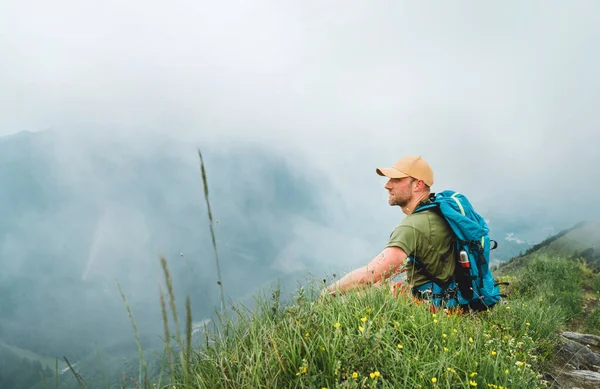 Tired Backpacker Man Has Rest Break Enjoying Cloudy Valley Bottom — Stock Photo, Image