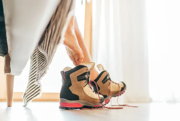 Young Sexy Barefoot Female Putting New Trekking Boots Untying Laces — Stock Photo, Image