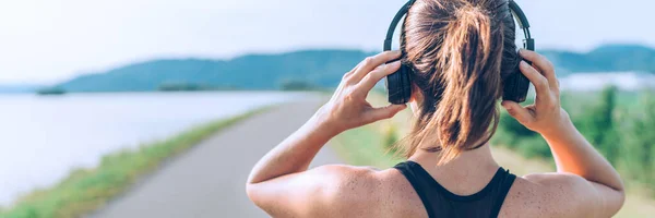 Young Teenager Girl Adjusting Wireless Headphones Starting Jogging Listening Music — Stock Photo, Image