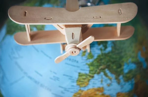 Wooden Model Vintage Airplane Earth Globe — Stock Photo, Image