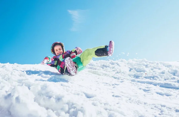 Happy Little Girl Slides Snow Slope — Stock Photo, Image