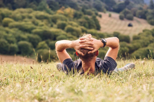 Man Lies High Green Grass — Stock Photo, Image