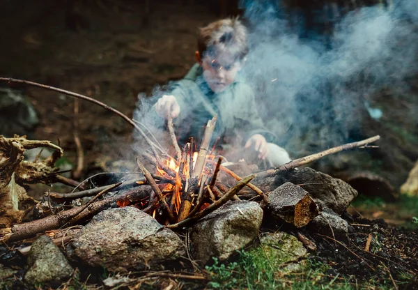 Little Boy Sits Campfire — Stock Photo, Image
