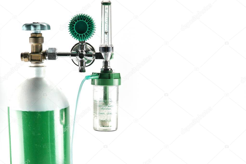 Equipment medical Oxygen tank and Cylinder Regulator gauge.Control pressure oxygen gas for care a patient respiratory disease and emergency CPR at Hospital, Close up focus on dark background.        