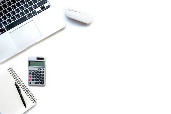 stock image Flat lay, top view office table desk. Workspace with calculator, pen , laptop , note on the white background.Copy Space for text,Empty Blank to word.Business Finance,Education Technology Concept.