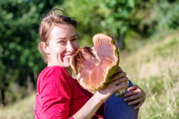 stock image Happy woman with big mushroom - boletus