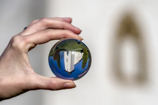 Church in Martincek, Slovakia. Crystal lensball photo — Stock Photo, Image