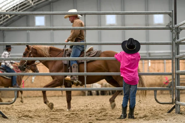 Cowboy kid watching at arena — Stock Photo, Image