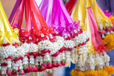 Phuang malai veya Malai çiçek Garland Tay bir formu vardır. Sık sık teklifleri verilen veya şans getirmesi için tuttu.