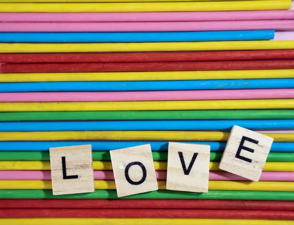 Love Message Written Wooden Blocks Placed Colourful Wood Sticks — Stock Photo, Image