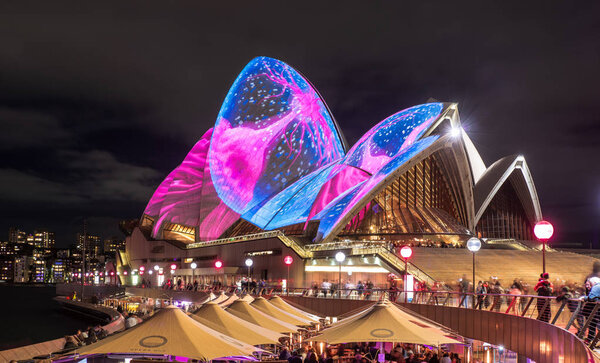 SYDNEY, AUSTRALIA -June 06, 2017. The Sydney Opera House sails  illuminated lights up during Vivid 2017 annual public event : A colorful design projected Festival of Light, Music & Ideas.
